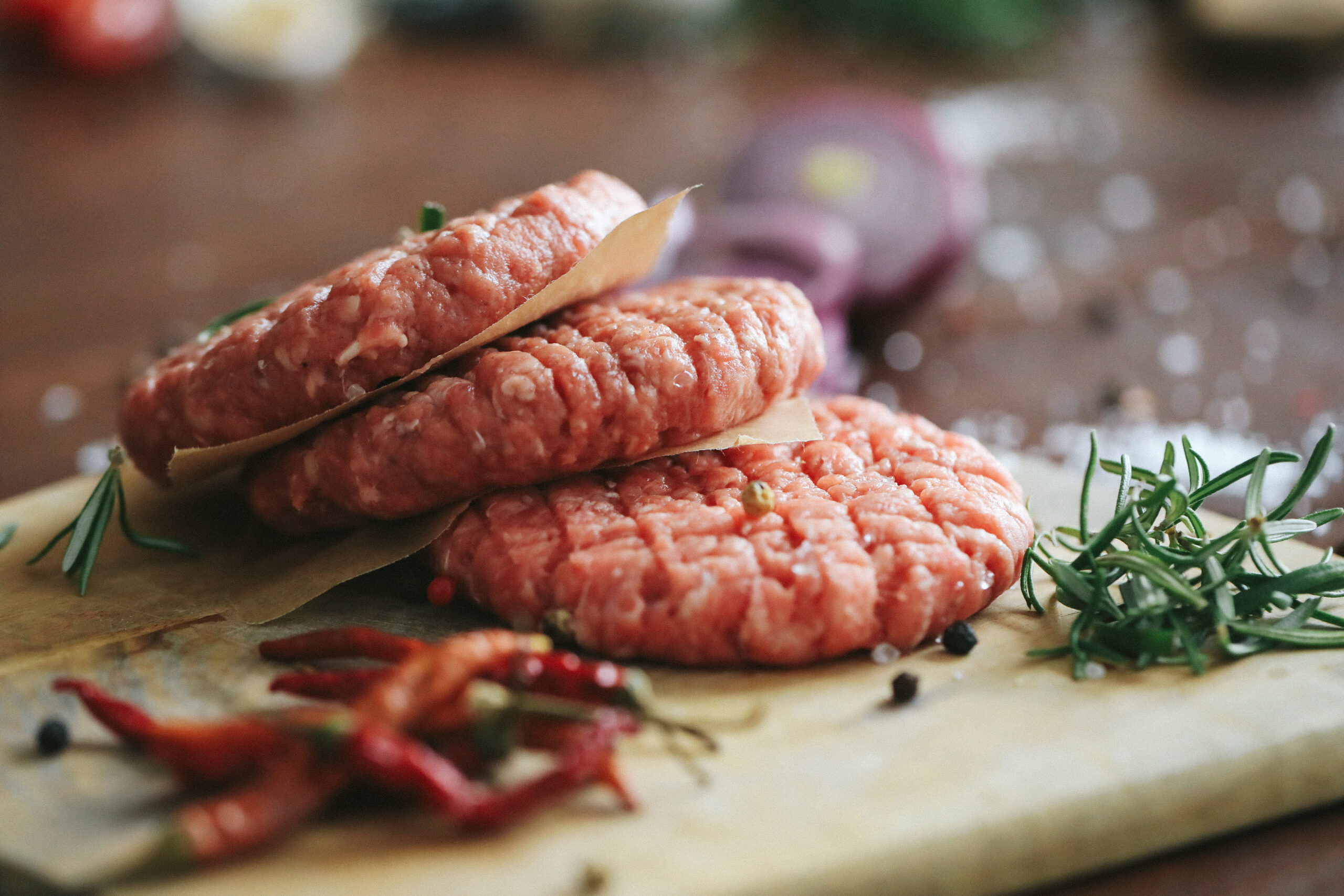 raw-beef-hamburger-patties-with-herbs-and-spices